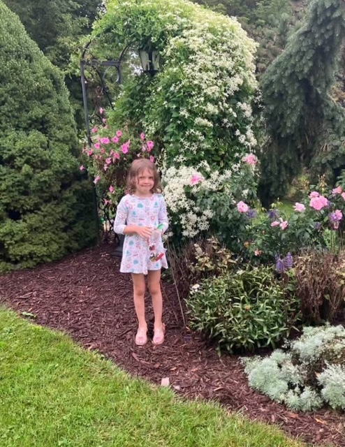 Attachment Cora in the garden.jpg