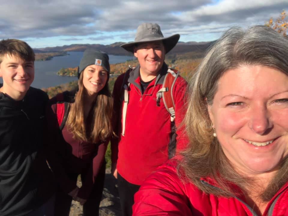 Celeste Carmichael and family on Rocky Mountain in the ADK