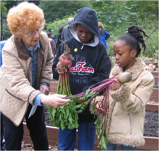 woman with children in garden